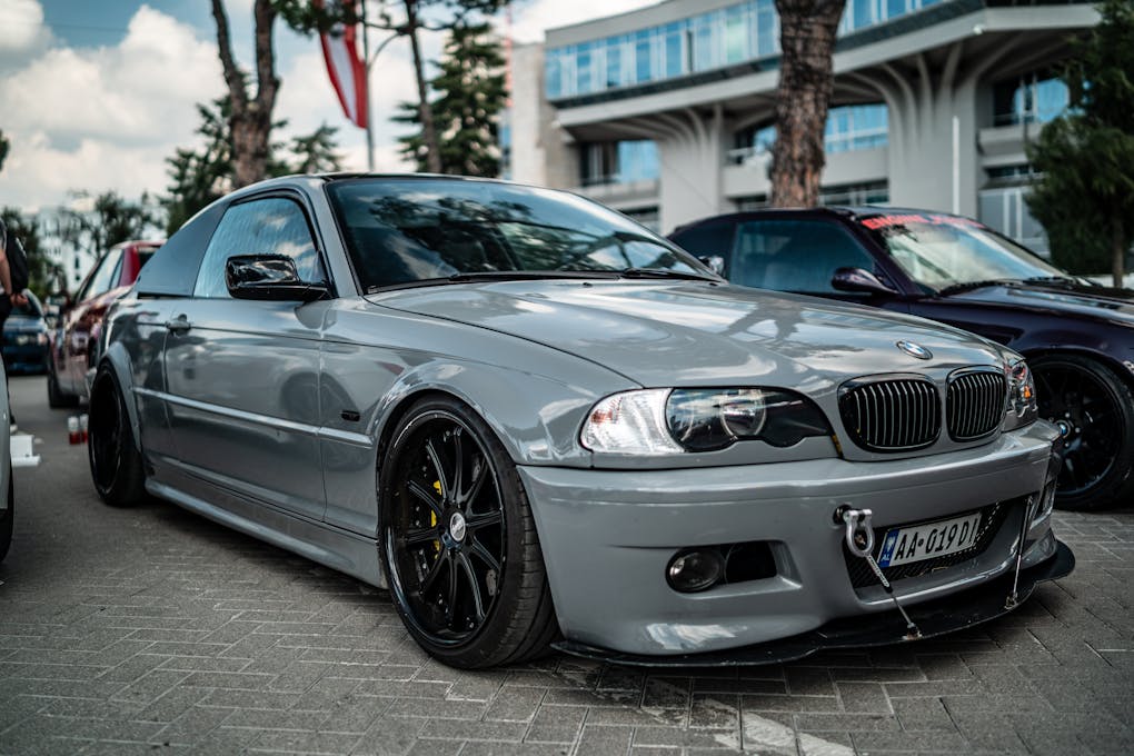 BMW 3 Series E46: Is This Still The Ultimate Daily Driver BMW? 7 A sleek grey BMW E46 showcased at an event