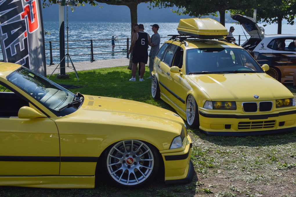 BMW 3 Series E36: The Last Cheap RWD Manual BMW Worth Buying? 5 two yellow BMW E36 tuned, parked.