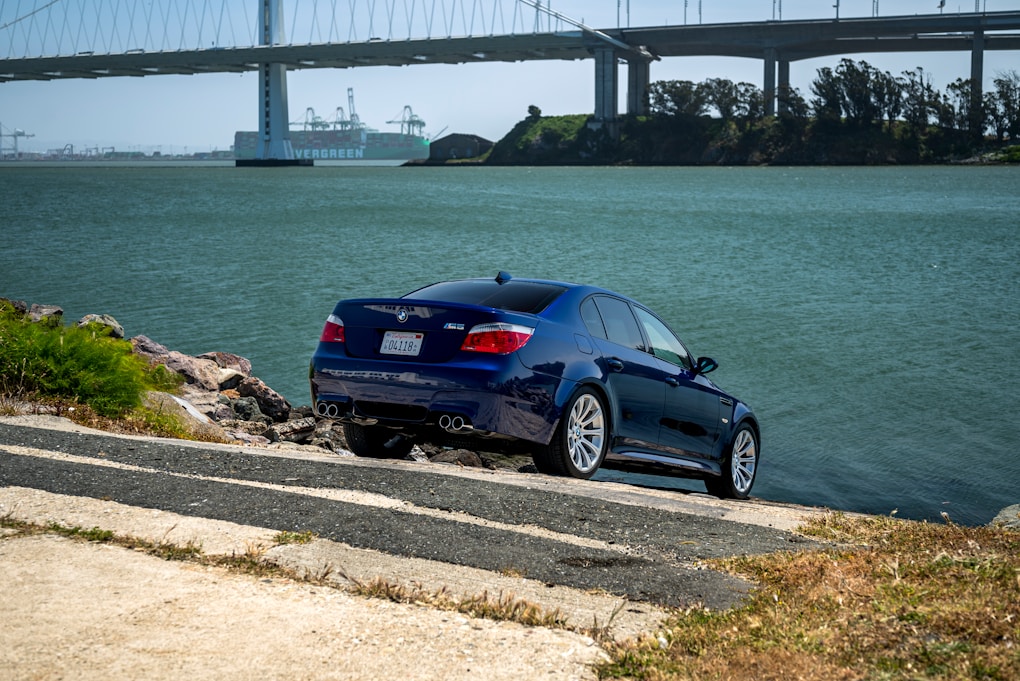 BMW M5 E60: The V10 Family Saloon 1 Blue M5 E60 parked near water