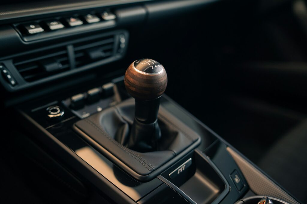 Why Manual Transmissions Are Actually Making a Comeback 3 Car's manual shift lever on the console.