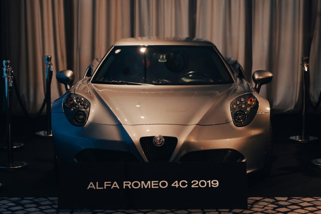 Why the Rare Alfa Romeo 4C Is Steadily Climbing in Value 5 An alfa romeo 4c sports car is on display.