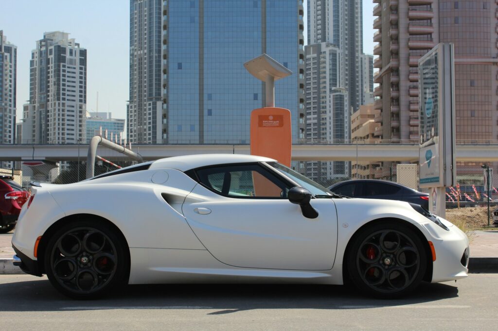 Why the Rare Alfa Romeo 4C Is Steadily Climbing in Value 6 White Alfa Romeo 4C - Side View