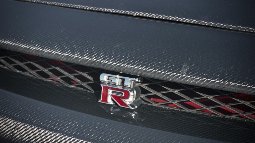 Why Do So Many Supercars Randomly Catch Fire? 3 A close up of the emblem on a car